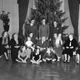 Image for article titled 70 Years of First Ladies Standing in Front of Christmas Trees